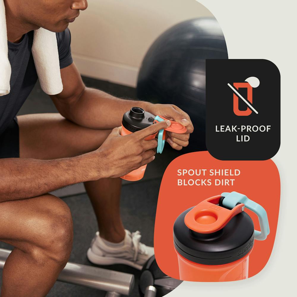 Man in gym holding shaker bottle