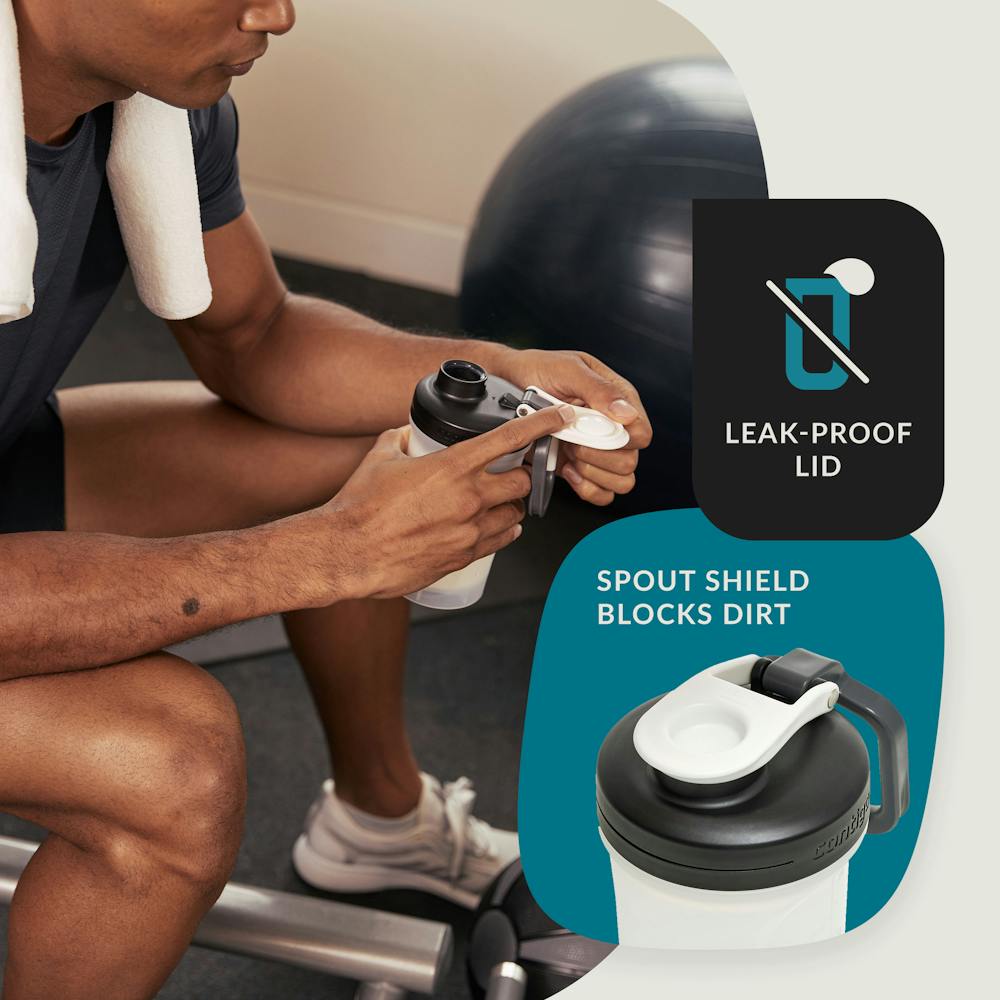 Man in gym holding shaker bottle